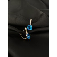 Сережки з блакитним стразом англійський замок золотого кольору 30721