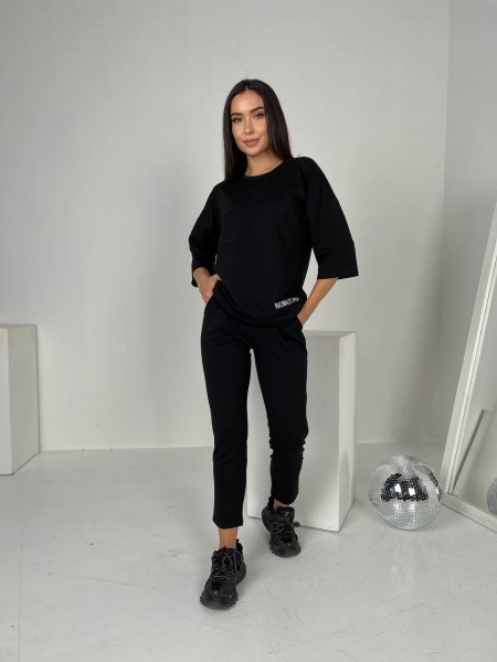 Легкий костюм для жінок чорного кольору 30836