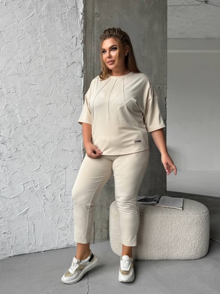 Легкий спортивный костюм молочного цвета 30944