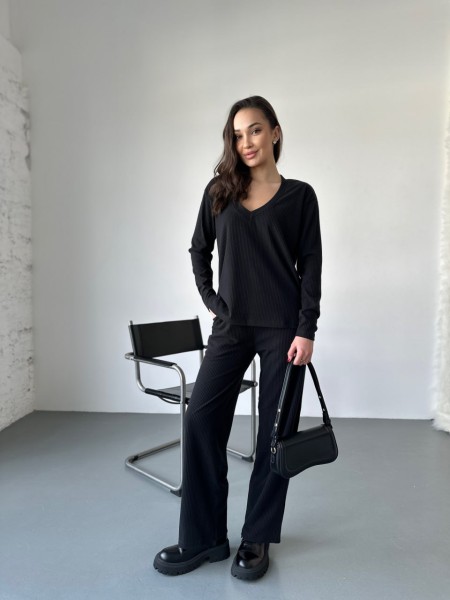 Женский прогулочный костюм из трикотажа в рубчик черного цвета 31198