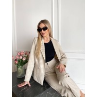 Жіночий класичний костюм бежевого кольору 31372