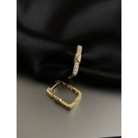 Сережки з камінчиками золотого кольору 31901