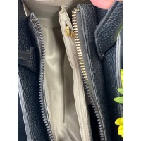 Жіноча дiлова сумка з пористої еко-шкіри чорного кольору 32071