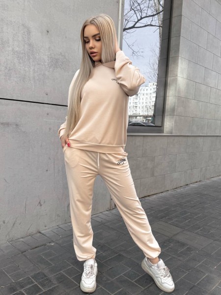 Жіночий спортивний костюм бежевого кольору 32141