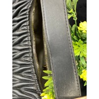 Жіноча сумка-багет із жатої еко-шкіри чорного кольору 32250