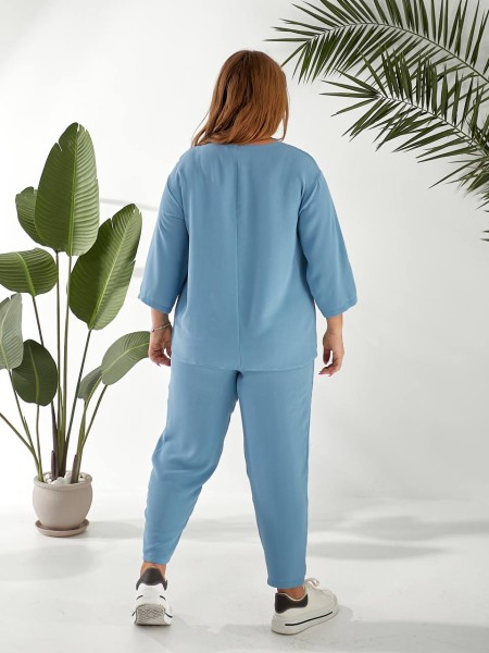 Жіночий прогулянковий костюм блакитного кольору 32324