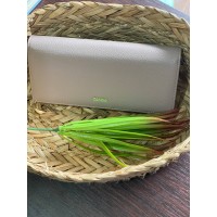 Жіночий гаманець з пористої еко-шкіри бежевого кольору 32384