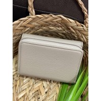 Жіночий компактний гаманець із пористої еко-шкіри бежевого кольору 32390