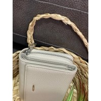 Жіночий компактний гаманець із пористої еко-шкіри бежевого кольору 32390