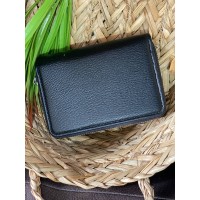 Жіночий компактний гаманець із пористої еко-шкіри чорного кольору 32420