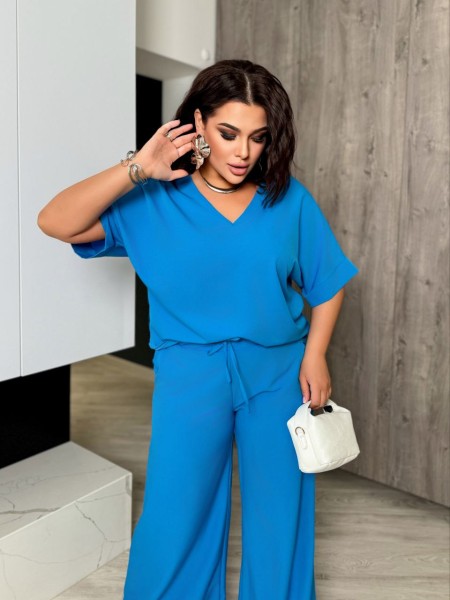 Легкий костюм брючний блакитного кольору 32471