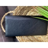 Жіночий гаманець з пористої еко-шкіри чорного кольору 32486