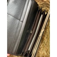 Жіночий гаманець з пористої еко-шкіри чорного кольору 32486