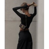Еластичний жіночий топ із рукавом чорного кольору 32501
