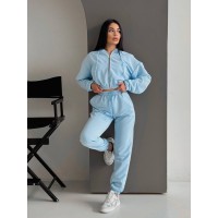 Жіночий спортивний костюм на змійці блакитного кольору 32700