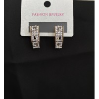 Сережки прямокутні з камінням золотого кольору англійський замок 32779