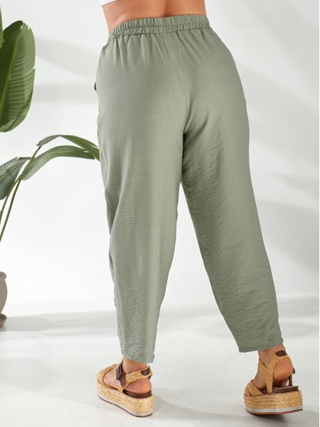 Жіночі штани вільного крою фiсташкового кольору 32792