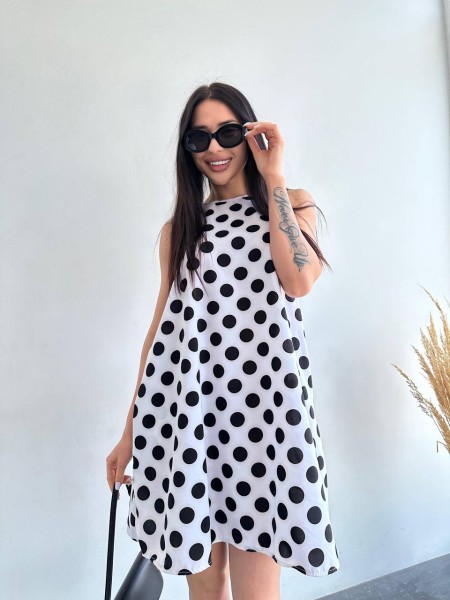Легка літня сукня в горох бiлого кольору 33078