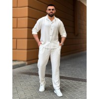 Чоловічий брючний костюм молочного кольору 33080