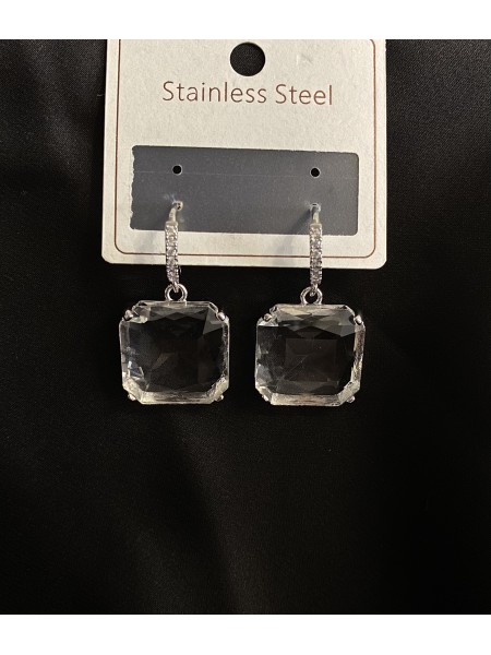 Сережки із прозорим каменем круглий замок срібного кольору 33126