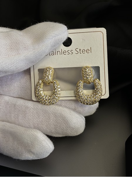 Сережки з камінчиками золотого кольору 33128