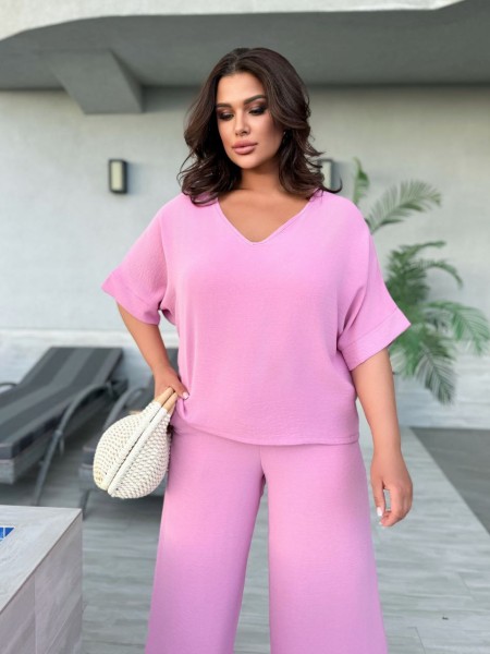 Легкий брючний костюм із крепу рожевого кольору 33183