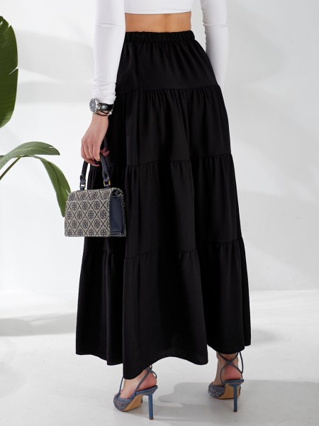 Жіноча льняна спідниця міді з воланами чорного кольору 33213