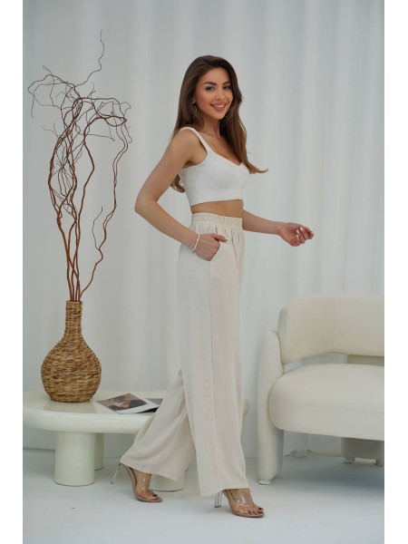 Жіночі легкі штани палаццо молочного кольору 33277