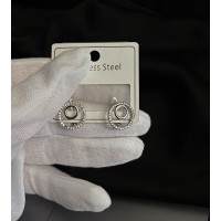 Сережки круглі з камінцями срібного кольору англійський замок 33353