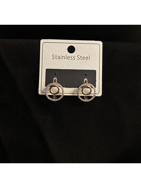 Сережки круглі з камінцями золотого кольору англійський замок 33354