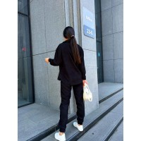 Жіночий костюм із мікровельвету на кнопках чорного кольору 26051 Vo