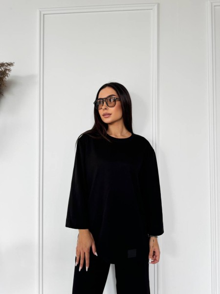 Жіночий прогулянковий костюм з теплого трикотажу чорного кольору 29703