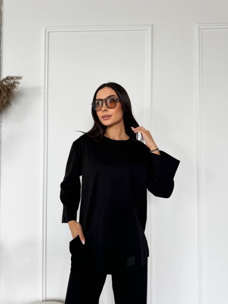 Жіночий прогулянковий костюм з теплого трикотажу чорного кольору 29703