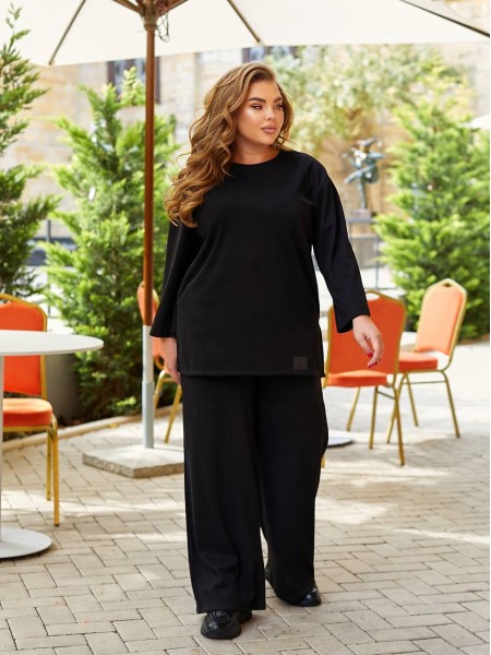 Жіночий прогулянковий костюм з теплого трикотажу чорного кольору 29708