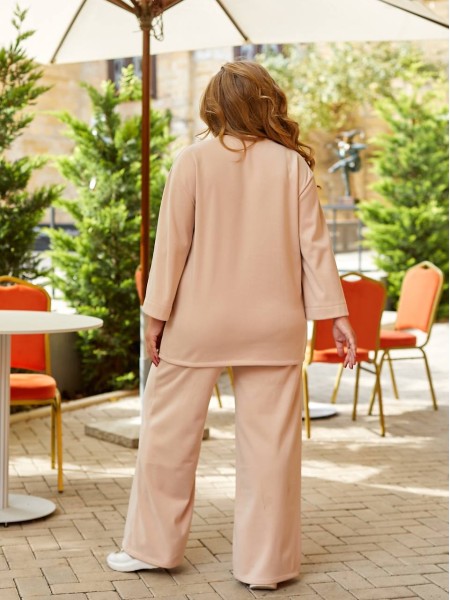 Жіночий прогулянковий костюм з теплого трикотажу молочного кольору 29709